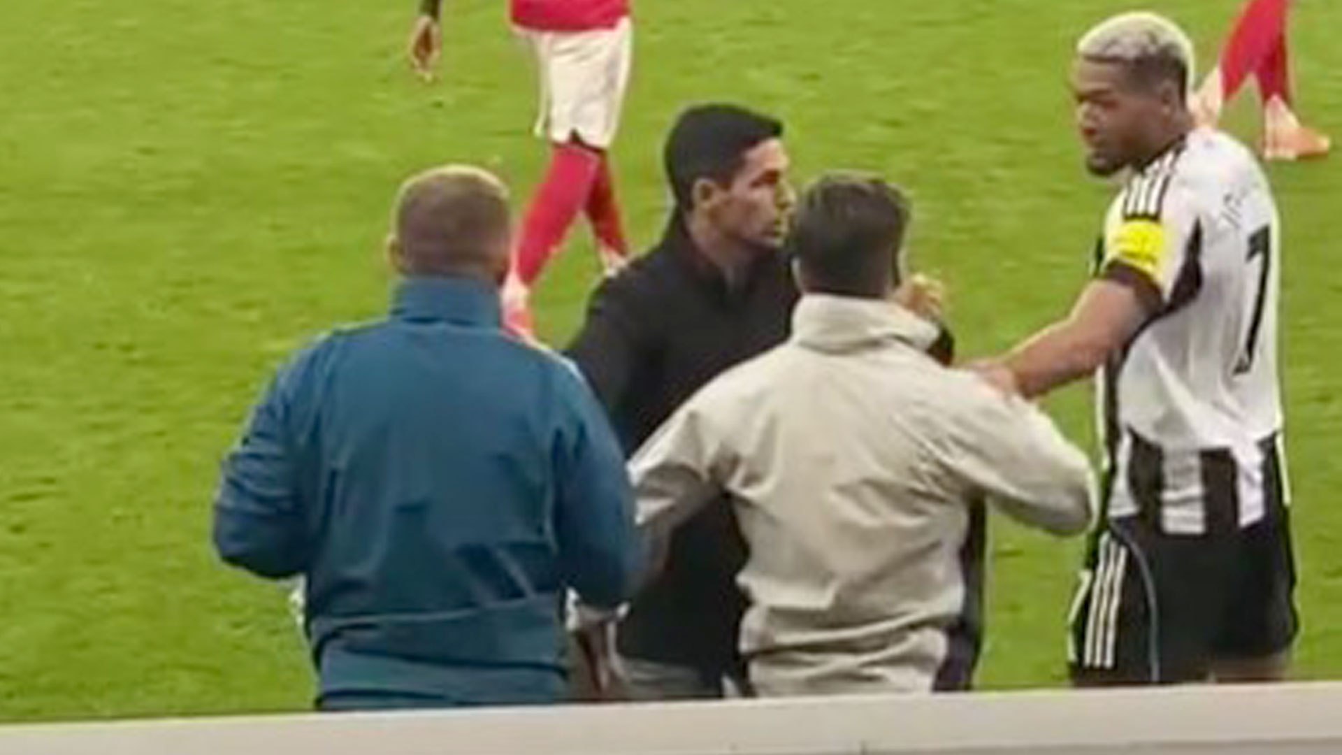 Arsenal coach held back by Arteta after heated confrontation with Newcastle star at final whistle